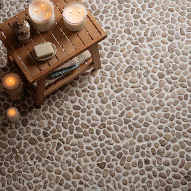 Pebble irregular mosaic tile shown on a bathroom floor