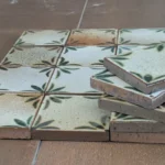 Hand-painted Seville glazed terracotta tile showing the natural variation in colour