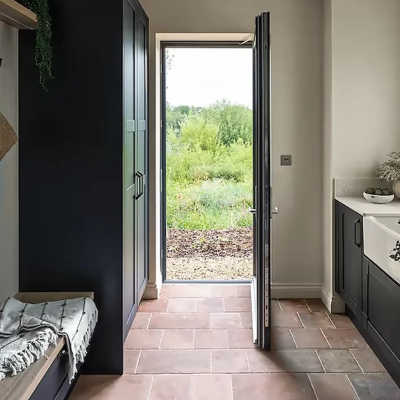 Brewhouse porcelain 45x22.5cm rectangle tile in earthy tones showed as a kitchen floor
