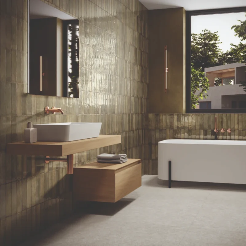 Feel olive green 25x6cm tile shown on a modern bathroom wall