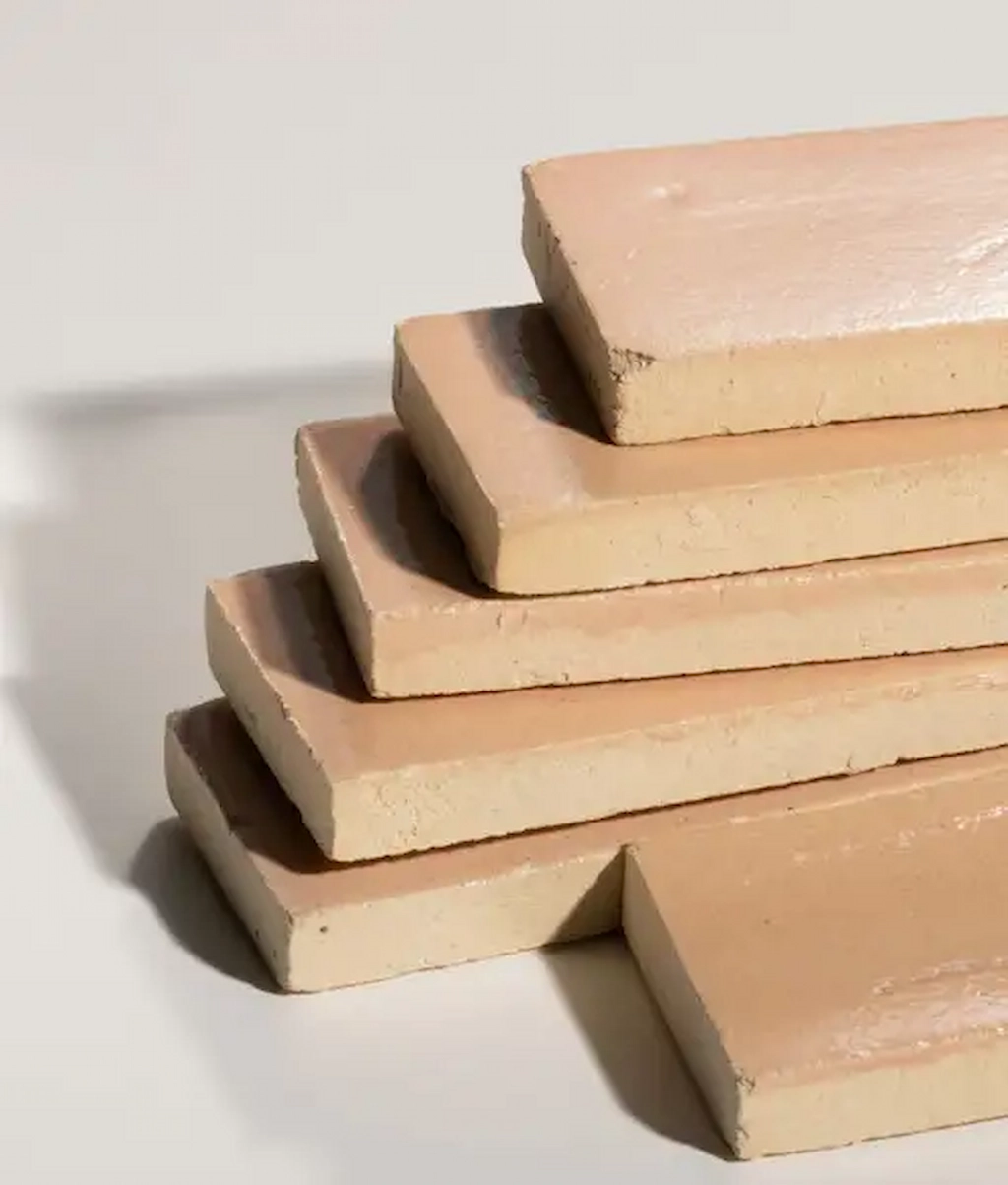 Stack of Stone Glaze Ceramic Petal Tiles 5x20cm in gloss finish, showing tile edges and surface detail