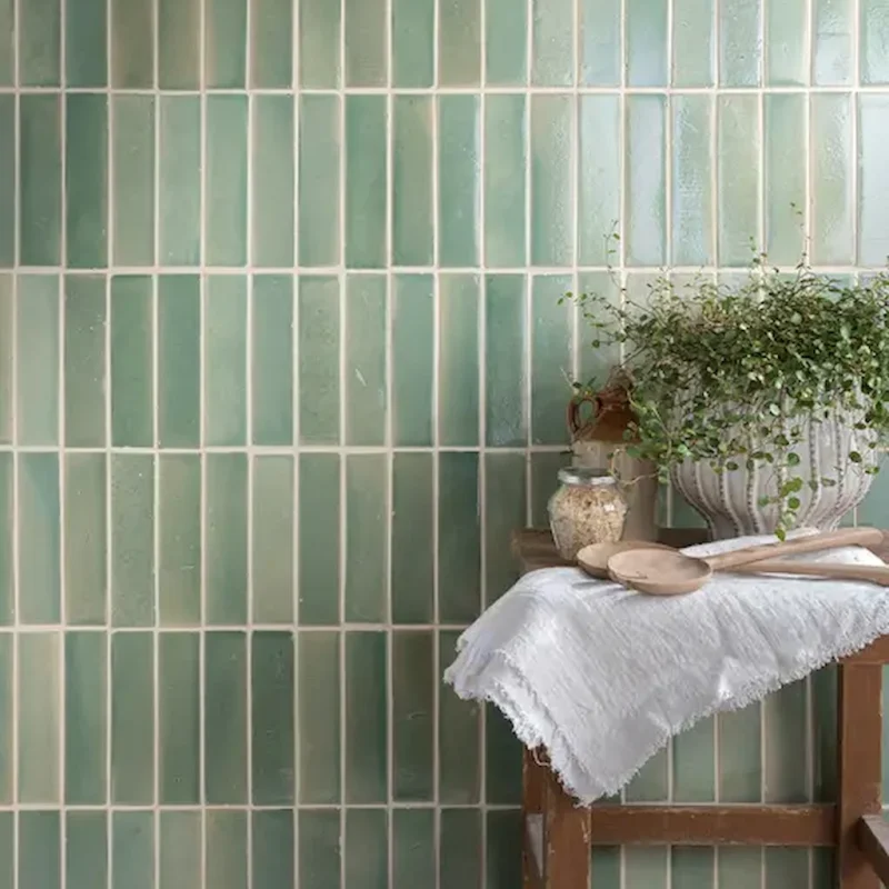 Stone Glaze Imperial Mentol 5x20cm ceramic wall tiles in a fresh mint-green shade with a glossy finish, laid in a vertical brick pattern