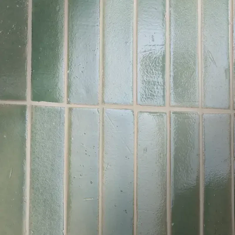 Close-up of Stone Glaze Imperial Mentol 5x20cm ceramic tiles showing glossy glaze, subtle tonal variation, and vertical layout