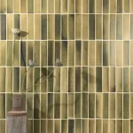 Stone Glaze Ceramic Lemongrass Tile 5x20cm in gloss finish, vertical brick layout styled with rustic vase