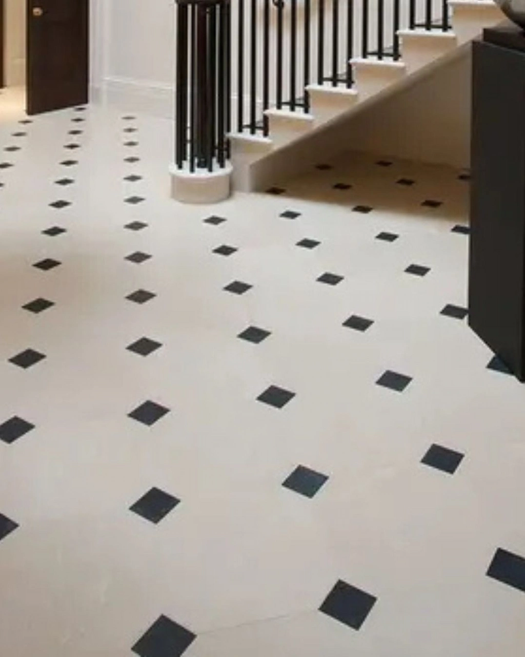 Pattern with four corners cut per tile and a central cabochon