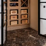 Versailles Marble Marron Honed 45.7x45.7cm tiles used in a wine room, showing rich brown tones and natural marble veining.