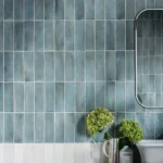 Oasis Veloute Ceramic Powder Blue wall tiles with a matt finish, showing some colour variation and a handmade-style surface.