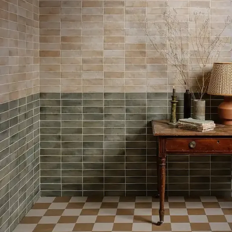 Oasis Veloute Ceramic Sand wall tiles laid in a horizontal pattern, showing warm sand and beige tones with soft shade variation in a calm interior setting.