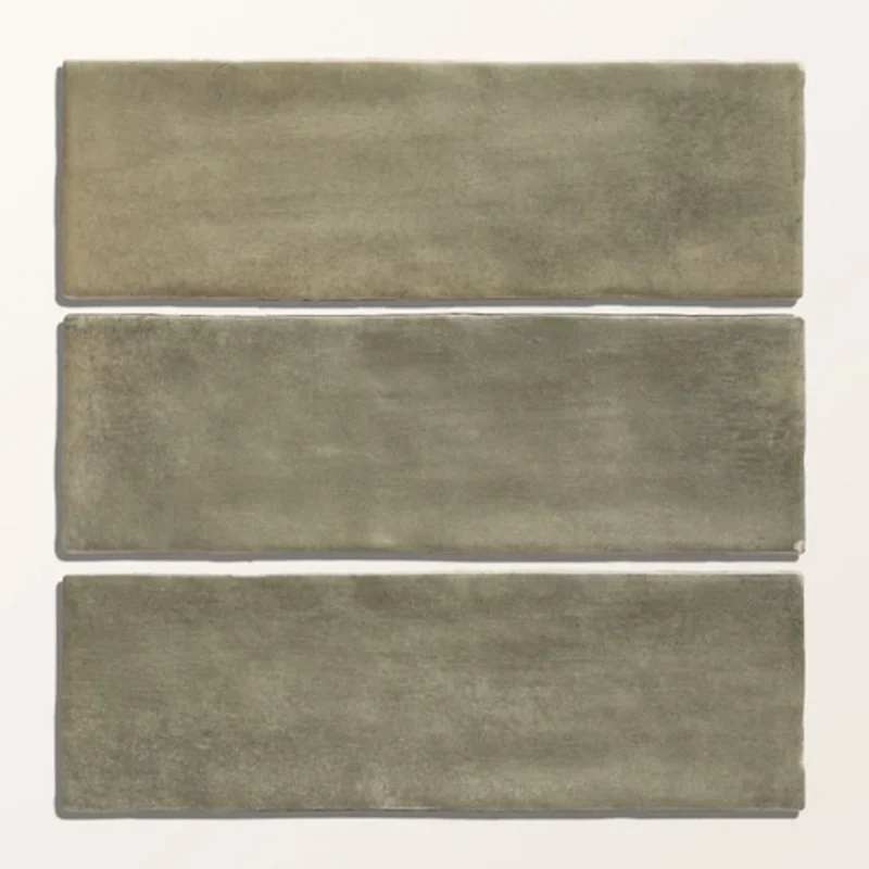Oasis Veloute Ceramic Sage tiles shown individually, highlighting the soft sage green colour, gentle shade variation and matt ceramic finish.