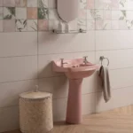 Fresco 99x32cm white matt tile shown on a bathroom wall with patchwork tiles