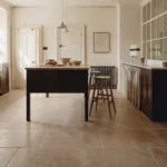 Romaine Limestone Tumbled Finish tiles in mixed random sizes laid in a classic natural stone floor pattern